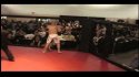 Double knock out when two fighters bust through cage door at MMA fight
